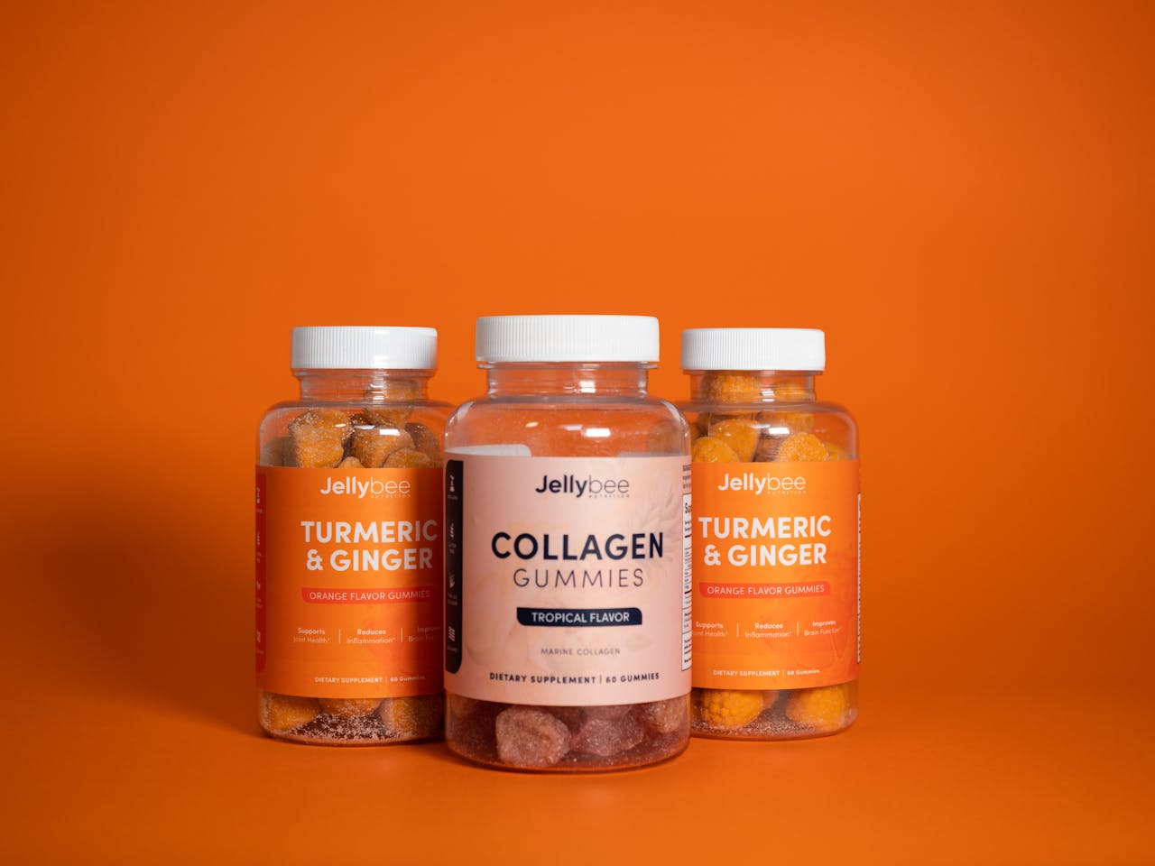 about-02 Colorful gummies with turmeric and collagen supplements in product shot.